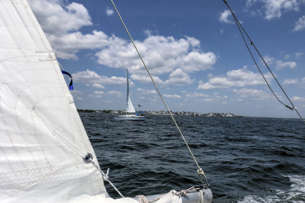 Passing a Sailboat with One Sail